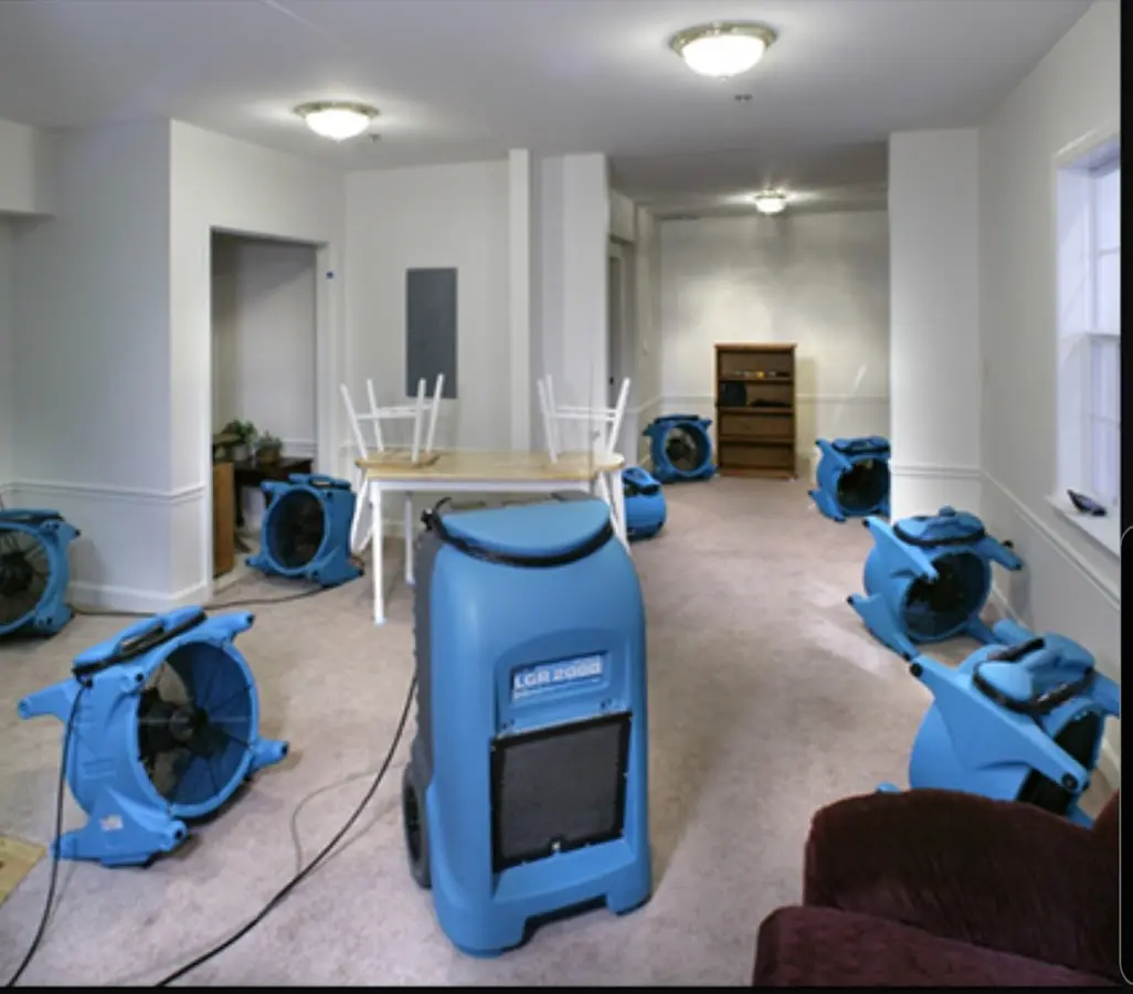Air movers and dehumidifier setup for Water Damage Restoration in Rifle